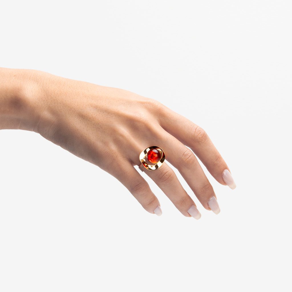 Ina handmade ring in 9k or 18k gold, sterling silver and amber in one hand designed by Belen Bajo