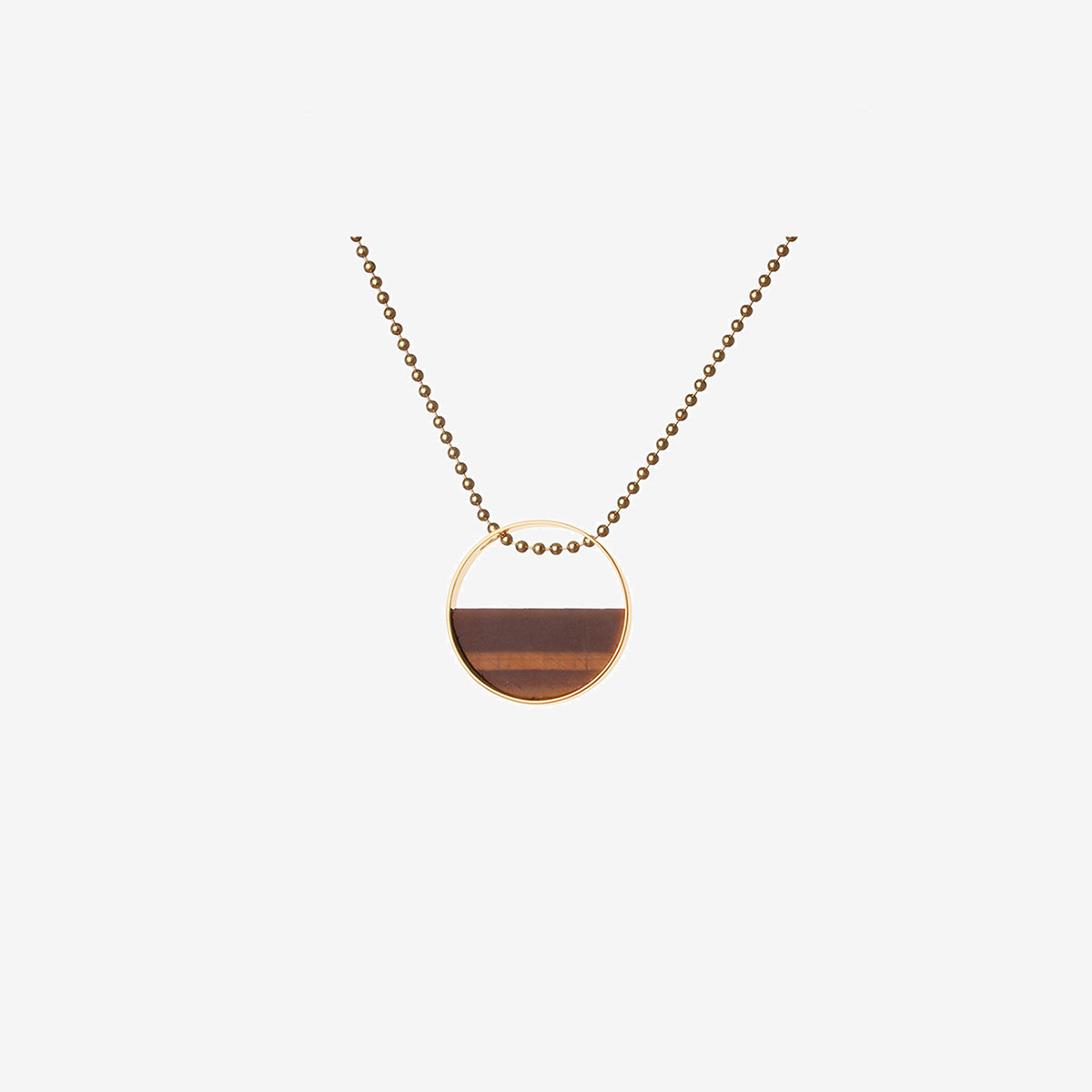 Ula handmade necklace in 9k or 18k gold, sterling silver and tiger eye designed by Belen Bajo
