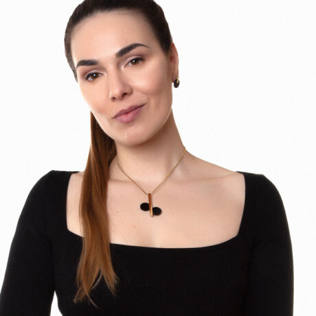 Oio handmade necklace in 9k or 18k gold, sterling silver and onyx designed by Belen Bajo m1