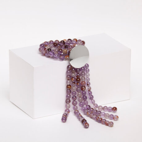 Pal handmade sterling silver and amethyst necklace supported on a prism designed by Belen Bajo