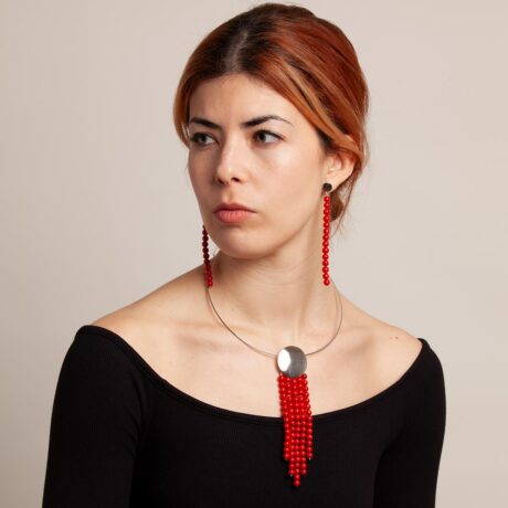 Handmade Tik necklace in sterling silver and coral in a model designed by Belen Bajo
