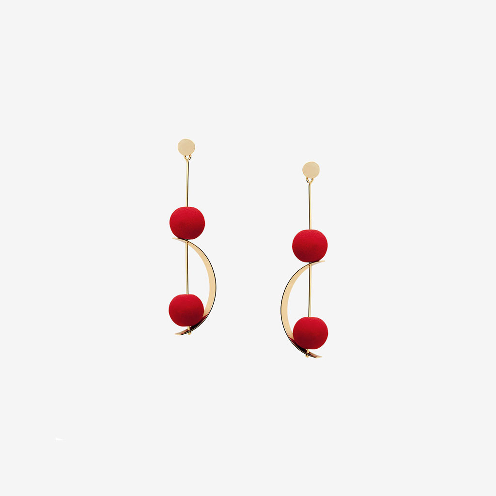 Sia handmade earrings in 9k or 18k gold and red lava designed by Belen Bajo