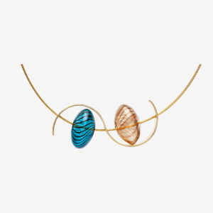 Xui handmade necklace in 18k gold plated 925 silver with oval shapes in blue and amber glass and gold galvanized steel chain designed by Belén Bajo.