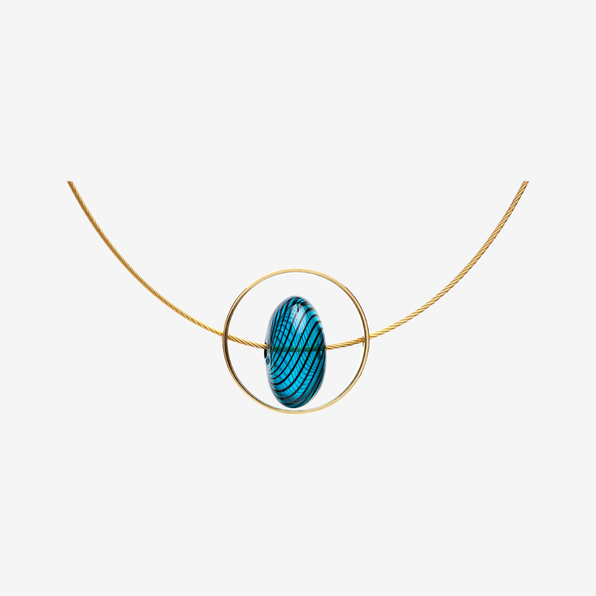 Xar handmade necklace in 18k gold plated 925 silver, blue glass and golden galvanized steel cable designed by Belen Bajo